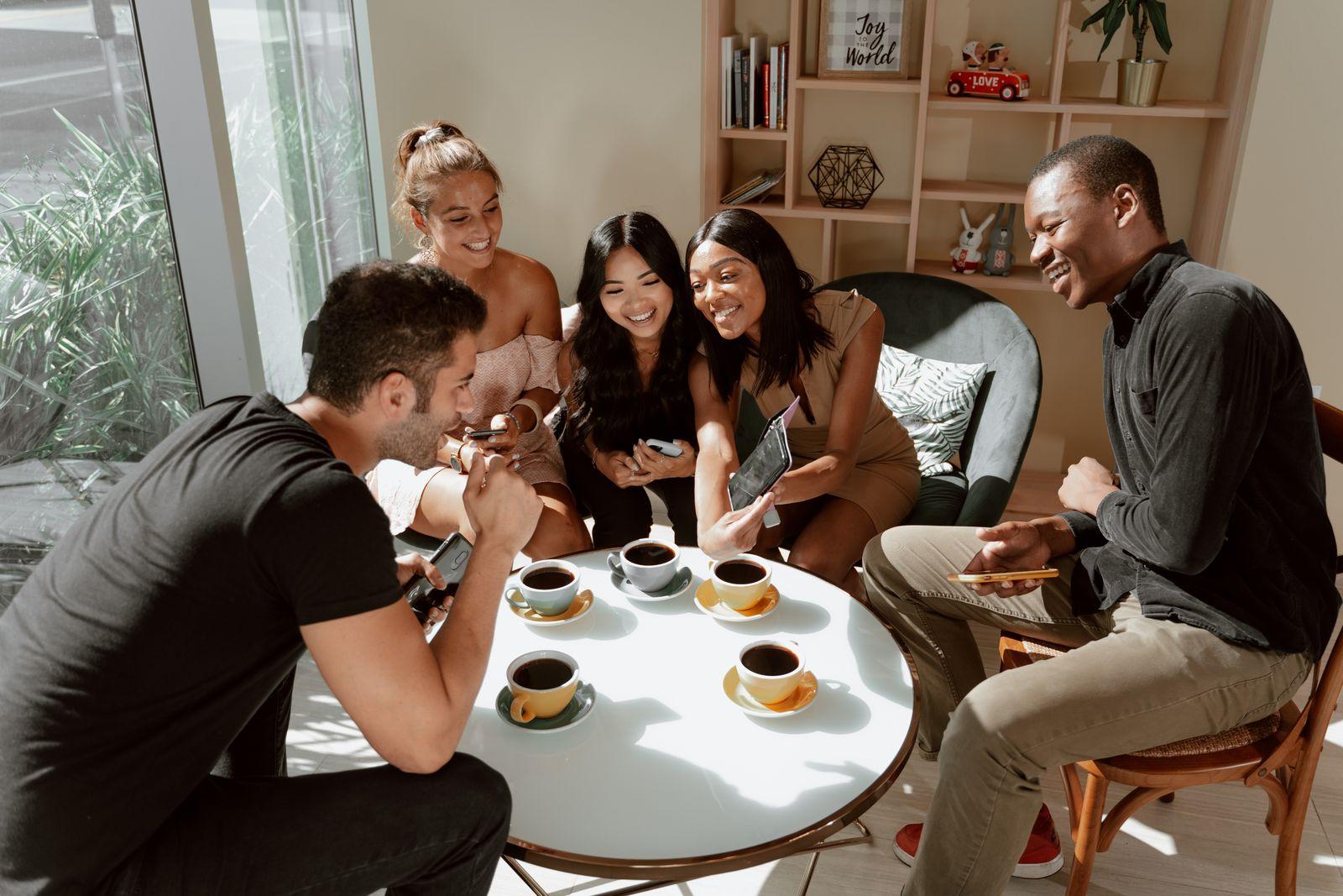 Friends sharing a moment together at a café